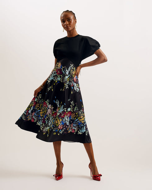 MAULINA-Dresses-MAULINA is made to flatter with its bias cut midi length and ponte bodice that create an elegant silhouette. This dress is fitted with a satin skirt that boasts a floral print, whilst the short sleeves come in a puff style for a touch of glam. Midi dress Ponte bodice Floral print satin skirt Short puff sleeves Crew neck Inverted V waist Bias cut Lydia is 5'10" / 1.77m and wears Black in a Ted size 1- Ted Baker Romania